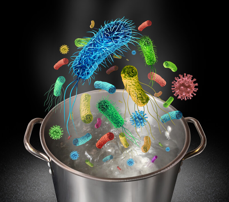 a pot of water contains germs and bacteria floating up out of the top