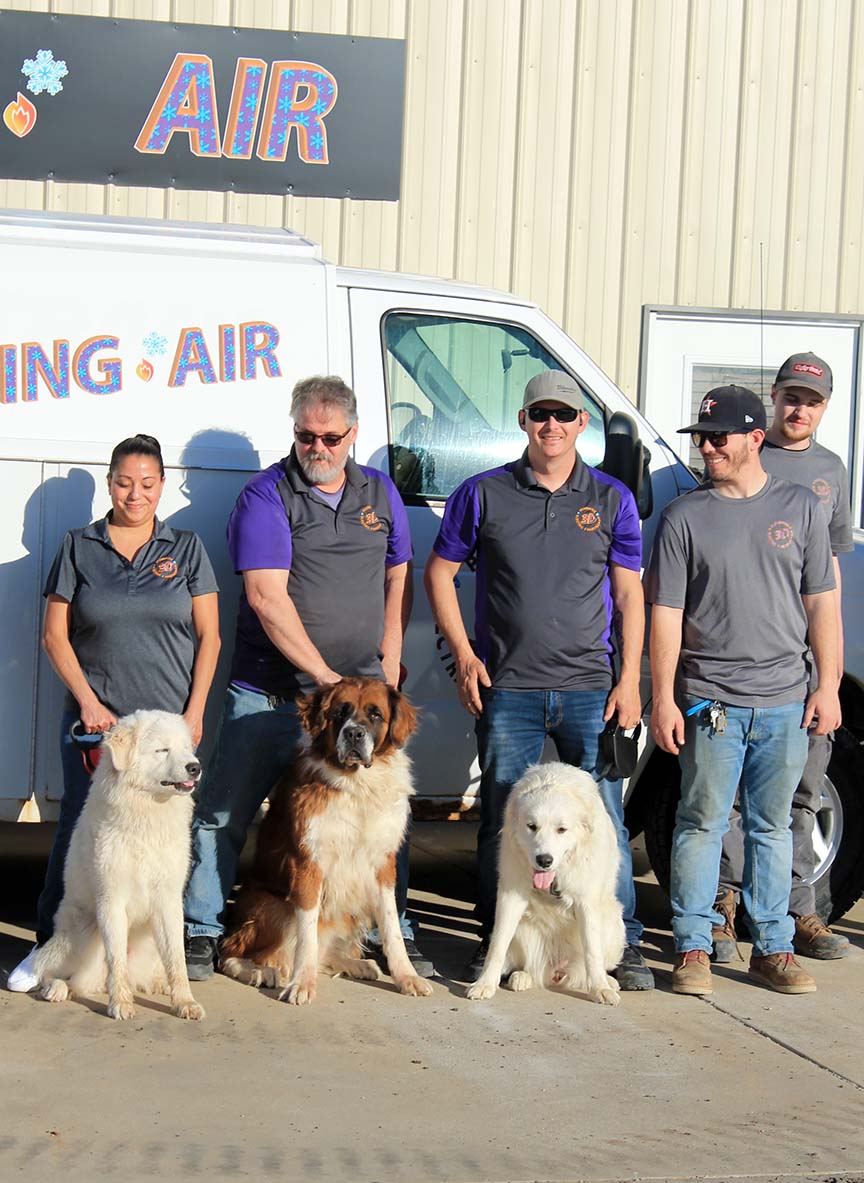 wichita team of electricians plumbers and heating air repair technicians with dogs